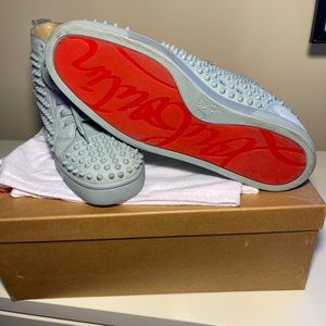 CHRISTIAN LOUBOUTIN
Blue Louis Spikes High-Top Sneakers